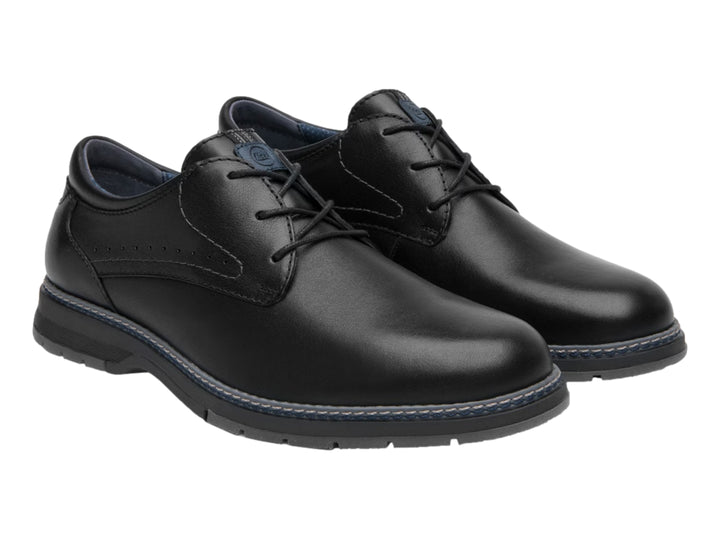 Zapato casual Flexi color negro de cuero con cordones y detalle de costura azul en la suela.