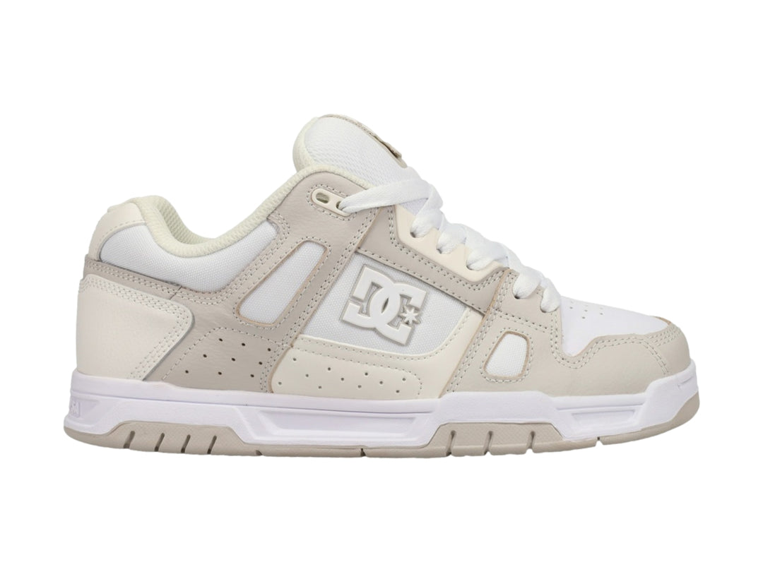 Tenis DC Shoes Stag Neon para hombre en colores blanco y crema con diseño deportivo.
