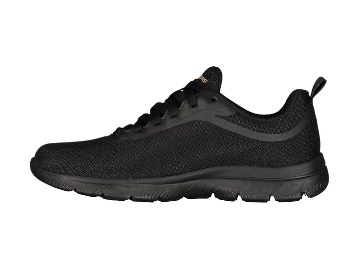 Tenis deportivos Skechers color negro con suela flexible y logotipo en dorado en el costado.