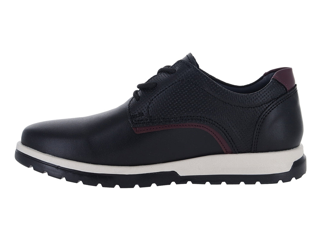 Zapato casual negro para niño con suela blanca y detalles en color guinda.