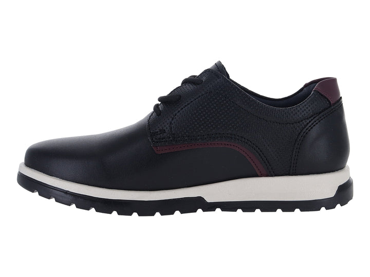 Zapato casual negro para niño con suela blanca y detalles en color guinda.