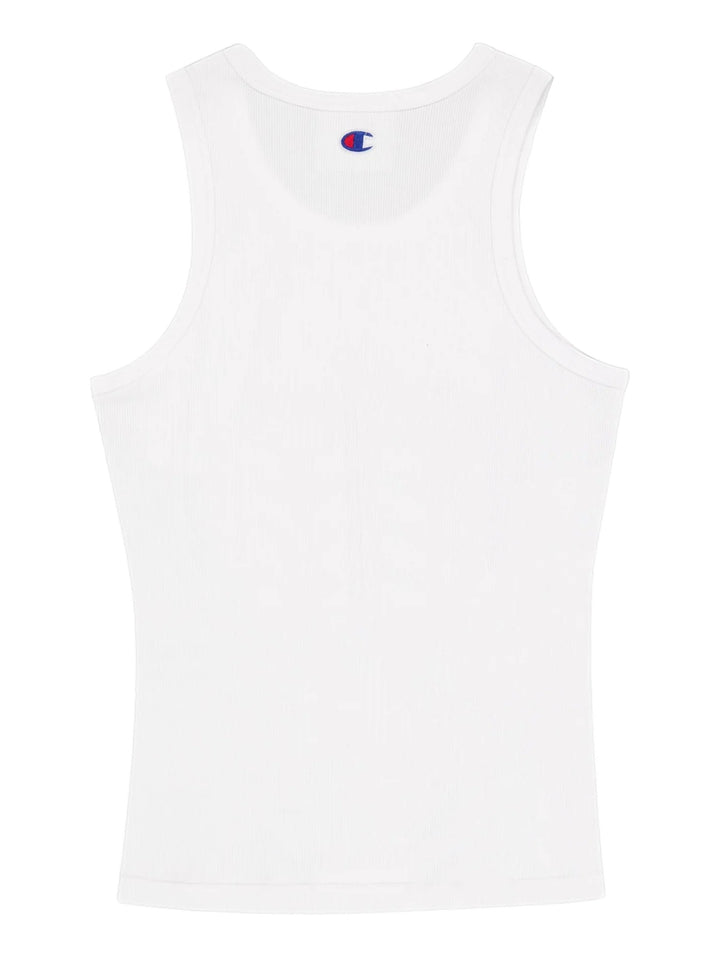 Camiseta blanca sin mangas de Champion con un diseño de flor roja y un ojo en el centro.