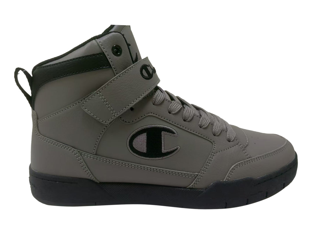 Tenis Champion Arena Power color gris con suela negra y correa ajustable para hombre.