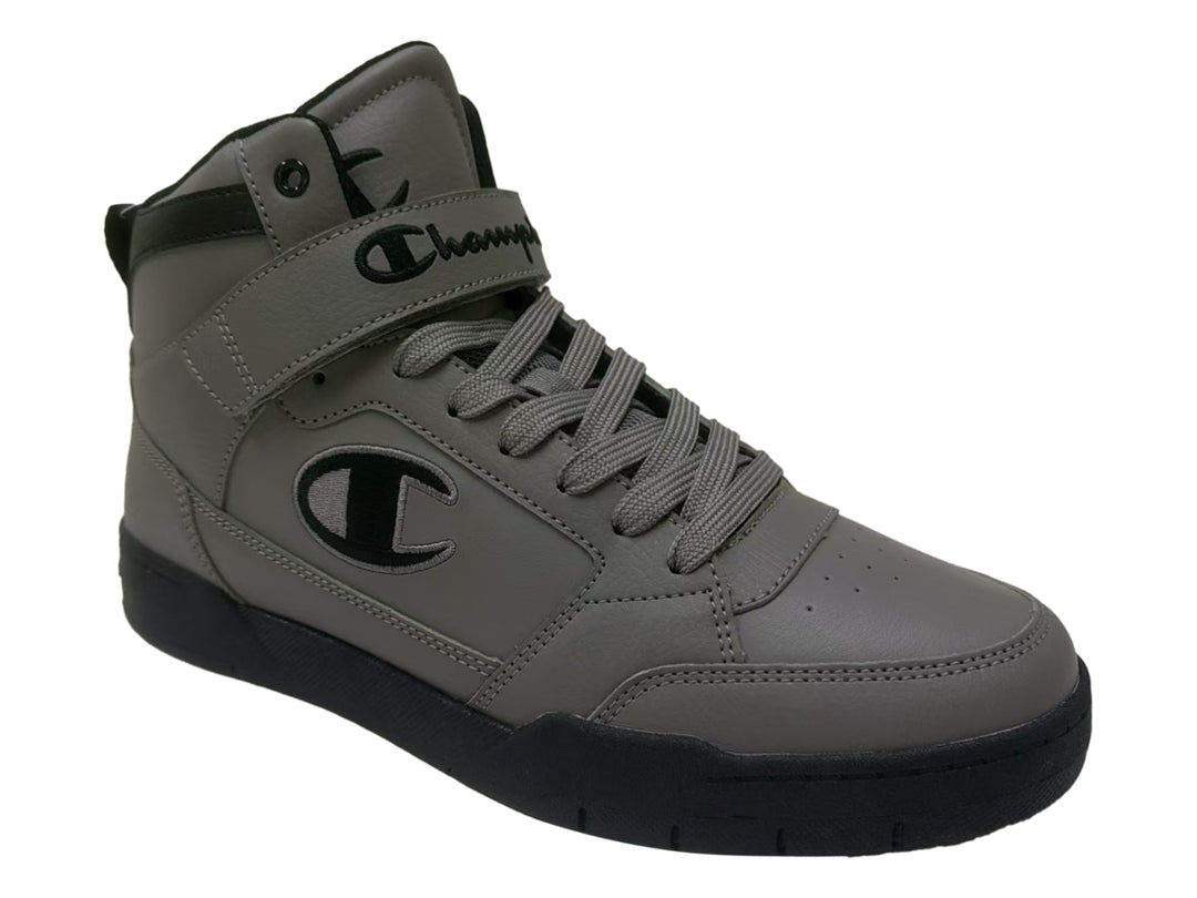 Tenis Champion Arena Power color gris con suela negra y correa ajustable para hombre.