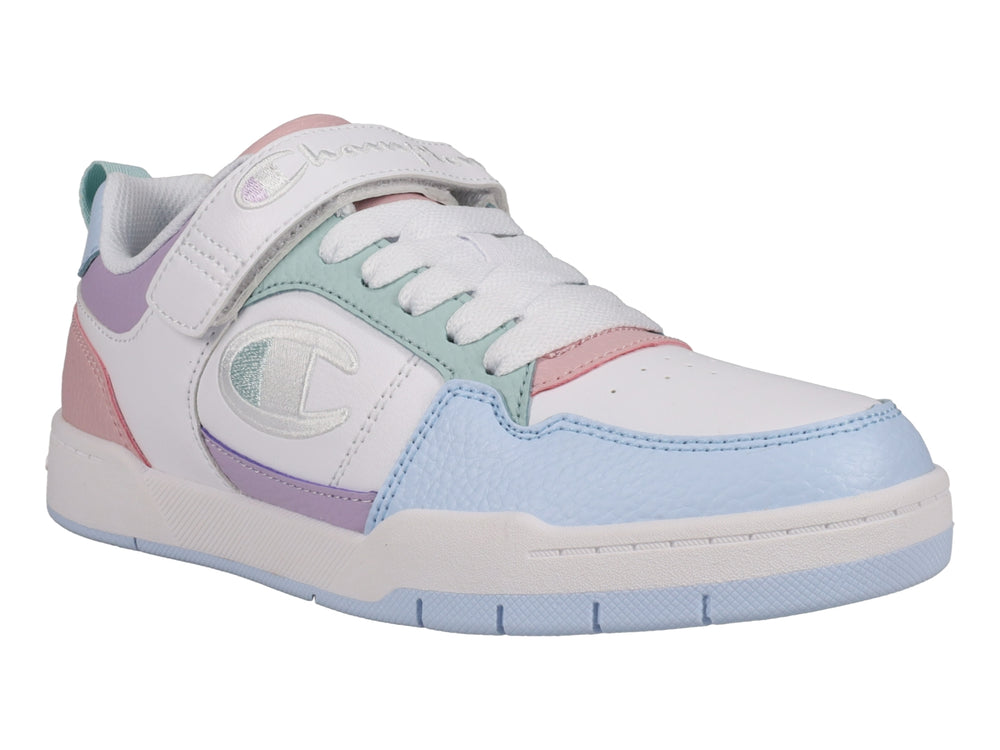 Tenis Champion en colores pastel con agujetas y correa de velcro sobre fondo blanco.