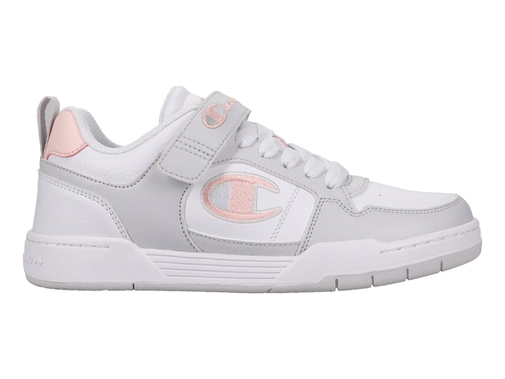 Tenis Champion Arena Power Low en colores blanco, gris y rosa con cierre de agujetas y correa de velcro.