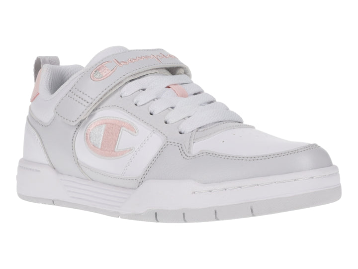 Tenis Champion Arena Power Low en colores blanco, gris y rosa con cierre de agujetas y correa de velcro.