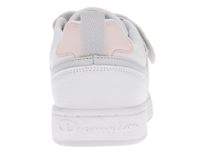 Tenis Champion Arena Power Low en colores blanco, gris y rosa con cierre de agujetas y correa de velcro.