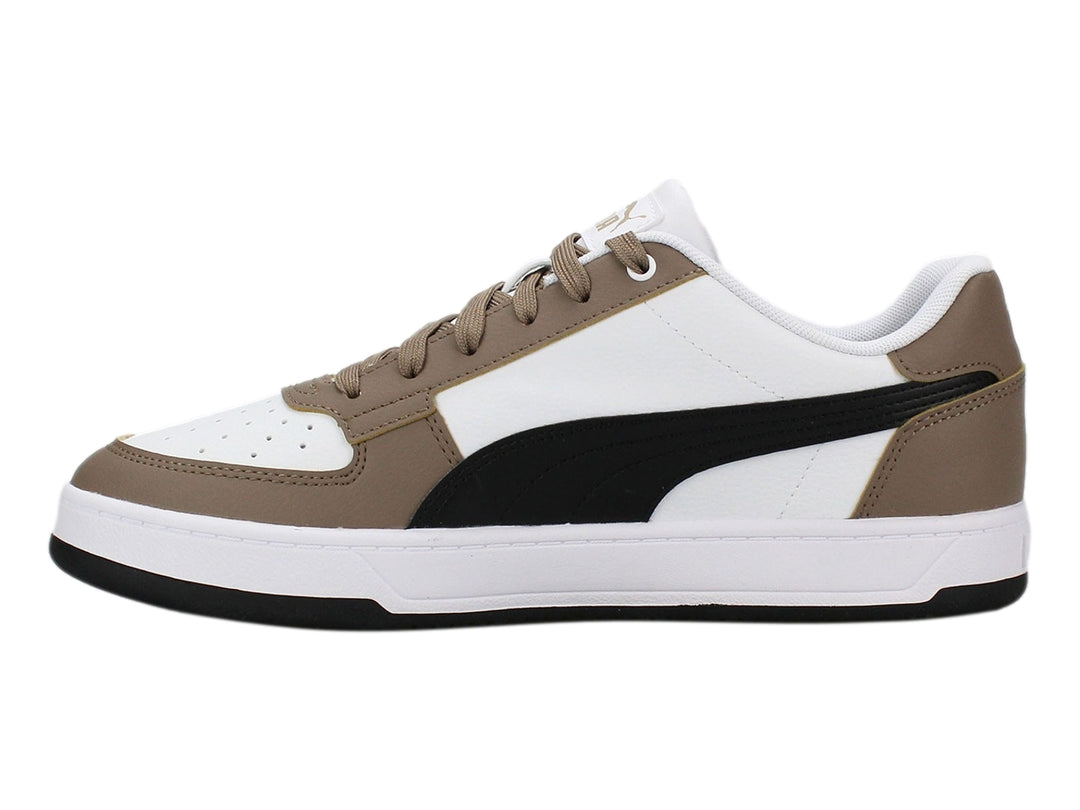 Tenis PUMA Caven 2.0 en colores blanco, negro y taupe con suela blanca y cordones a juego.