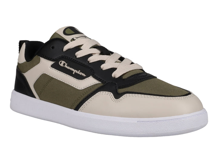Tenis Champion de lona en colores oliva, beige y negro con suela blanca.