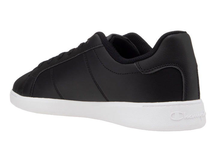 Tenis Champion color negro con suela blanca y logotipo lateral en blanco y rojo.