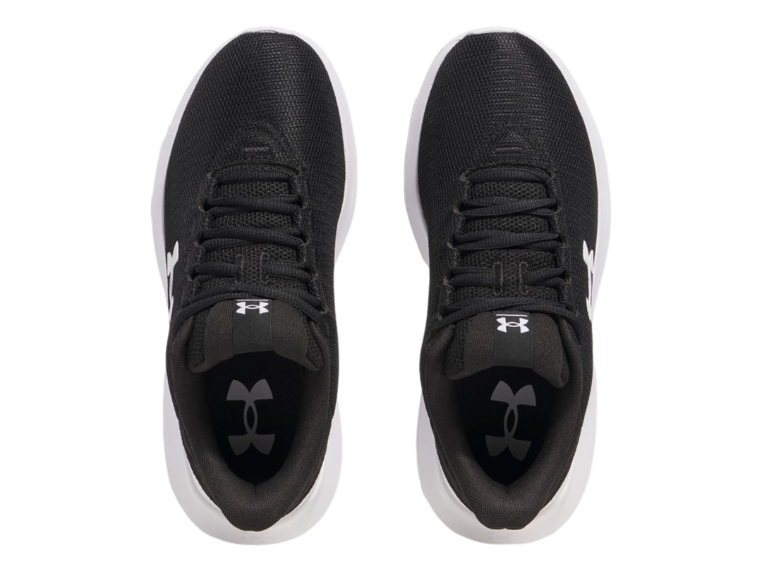 Tenis deportivos Under Armour Phade RN 3 en color negro con suela blanca y logotipo blanco lateral.