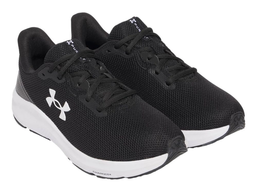 Tenis deportivos Under Armour color negro con suela blanca y logotipo blanco lateral.