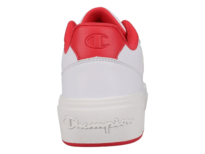 Tenis Champion blancos con detalles y cordones en color rosa.