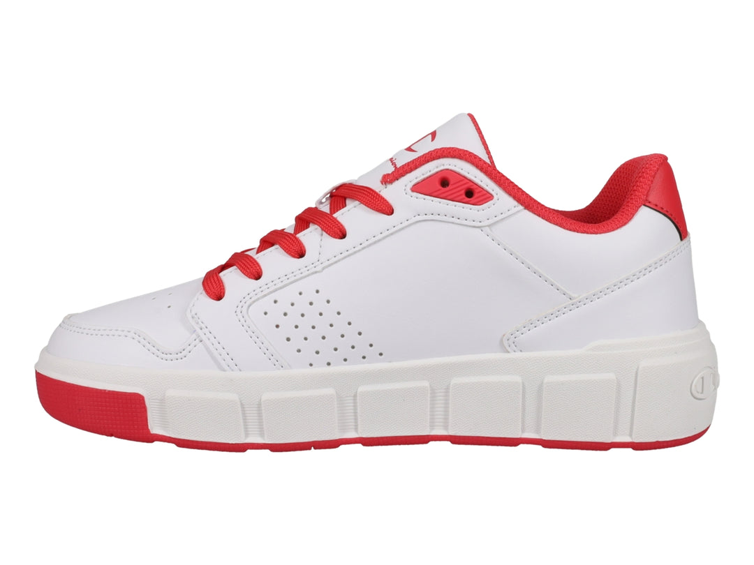 Tenis Champion blancos con detalles y cordones en color rosa.