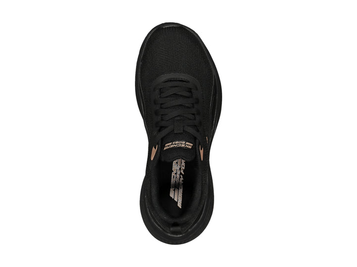 Tenis deportivos Skechers color negro con detalles en oro rosa y suela Vaporslay.