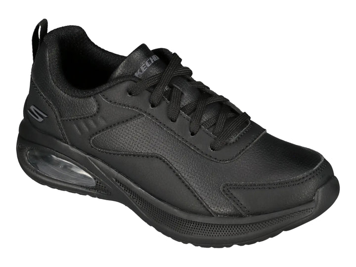 Tenis deportivos Skechers color negro con cámara de aire visible en el talón.