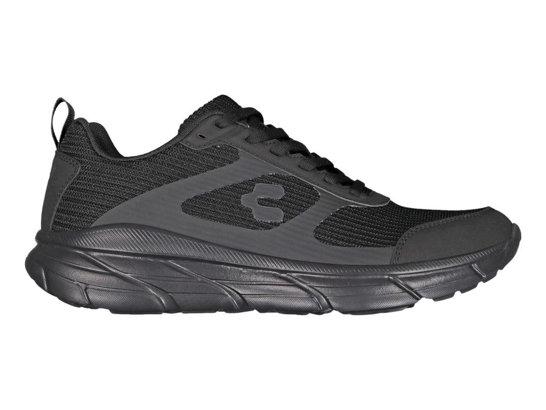 Tenis deportivos Charly color negro con malla transpirable y suela robusta.