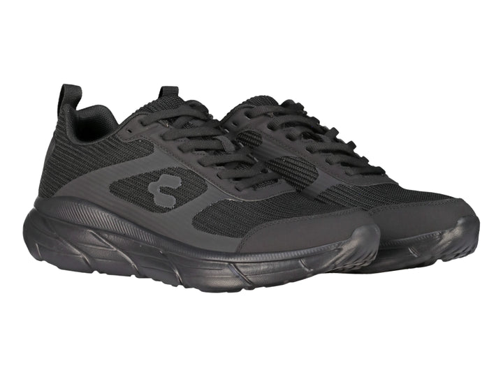 Tenis deportivos Charly color negro con malla transpirable y suela robusta.