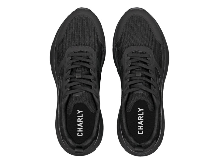 Tenis deportivos Charly color negro con malla transpirable y suela robusta.