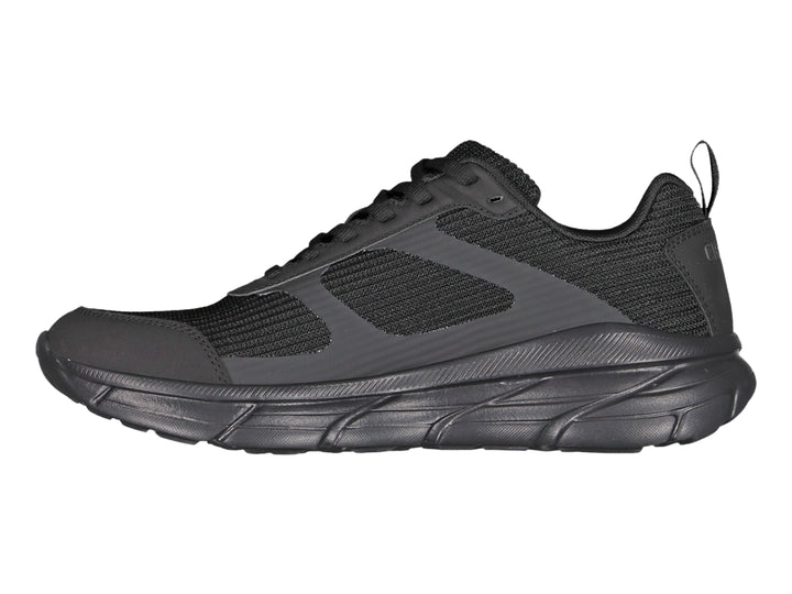 Tenis deportivos Charly color negro con malla transpirable y suela robusta.