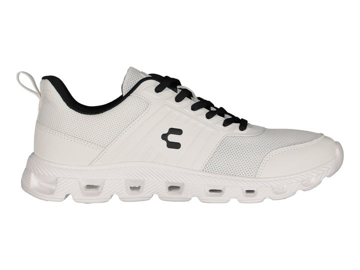 Tenis deportivos Charly color blanco con detalles en negro y suela blanca.