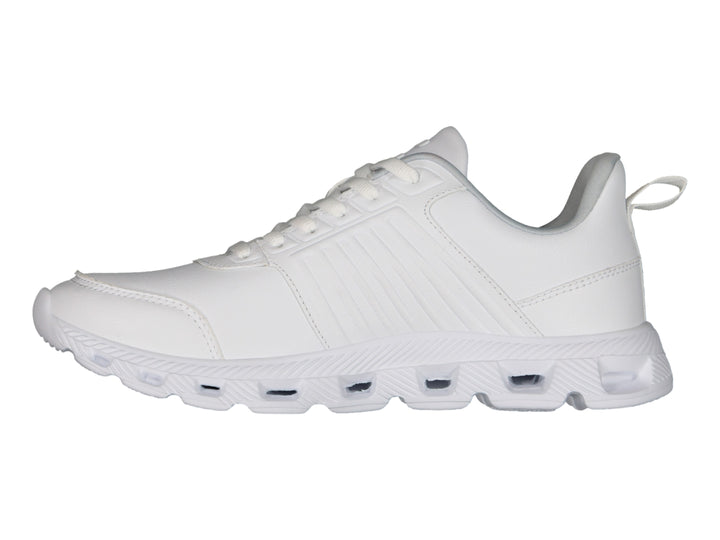 Tenis deportivos Charly color blanco con suela blanca y cordones, vista lateral.