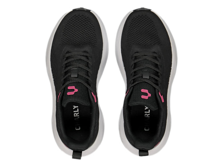 Tenis Charly color negro con suela blanca y detalles en rosa, estilo deportivo casual.