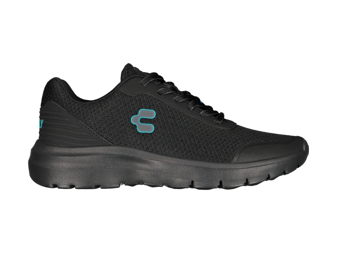 Tenis casuales Charly color negro con suela gruesa y logotipo azul claro.
