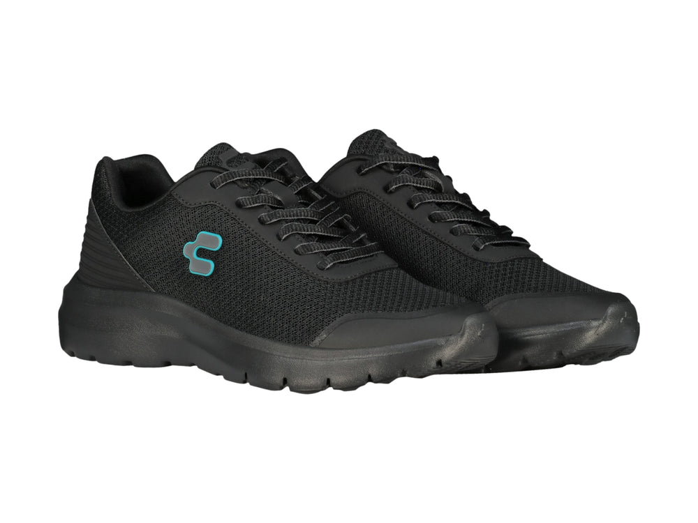Tenis casuales Charly color negro con suela gruesa y logotipo azul claro.
