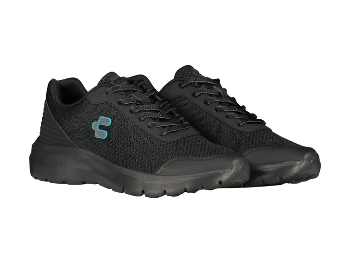 Tenis casuales Charly color negro con suela gruesa y logotipo azul claro.