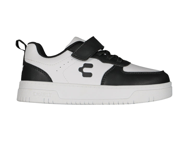 Tenis Charly para niño en colores blanco y negro con cierre de velcro y suela blanca.