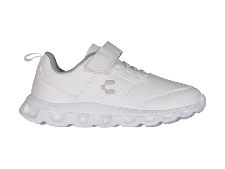 Tenis deportivos Charly para niño en color blanco con detalles en gris y cierre de velcro.