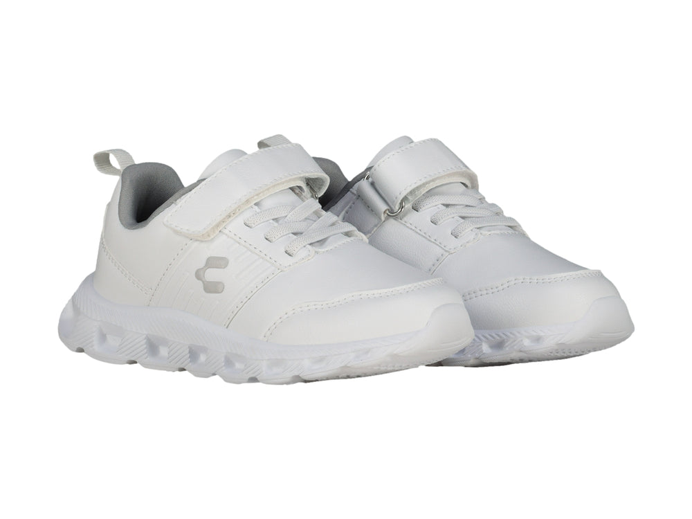 Tenis deportivos Charly para niño en color blanco con detalles en gris y cierre de velcro.