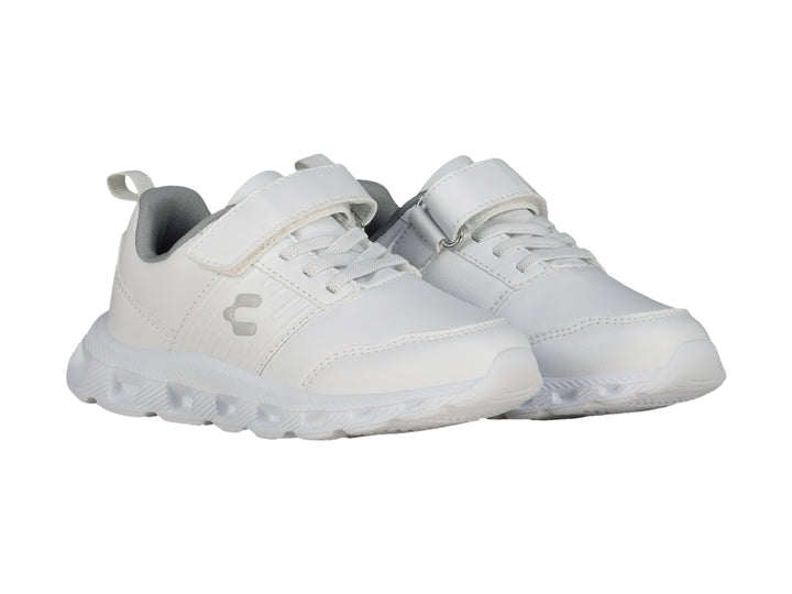 Tenis deportivos Charly para niño en color blanco con detalles en gris y cierre de velcro.