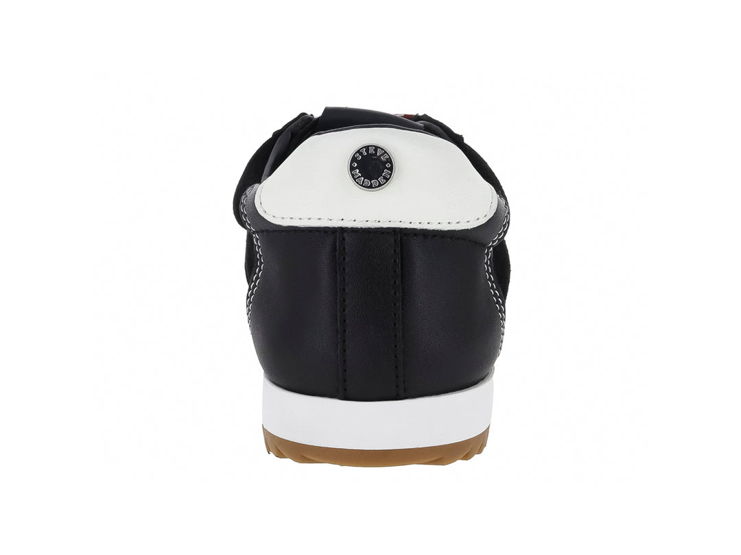 Tenis Steve Madden de gamuza negra con suela blanca, detalles en blanco y cordones rojos.