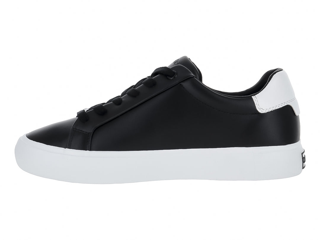 Tenis Calvin Klein de cuero negro con suela blanca y agujetas negras para Mujer.