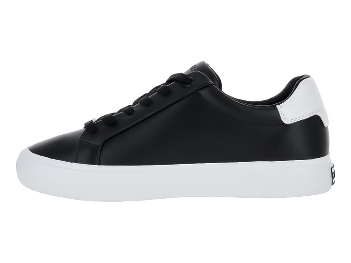 Tenis Calvin Klein de cuero negro con suela blanca y agujetas negras para Mujer.