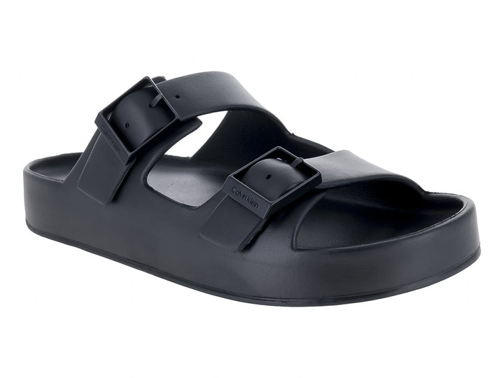 Sandalias negras de plataforma Calvin Klein con dos correas ajustables y hebillas.