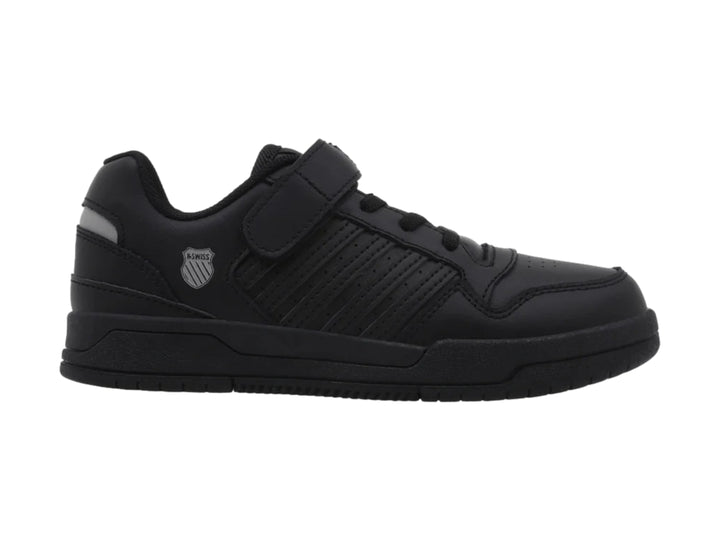 Tenis K-Swiss color negro monocromático con correa de velcro y agujetas para Niño.