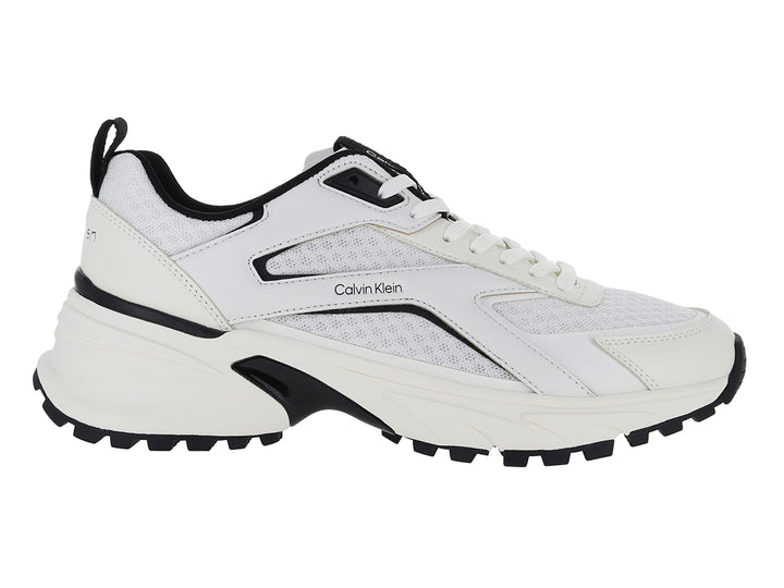 Tenis deportivos Calvin Klein color blanco con detalles y suela en color negro.