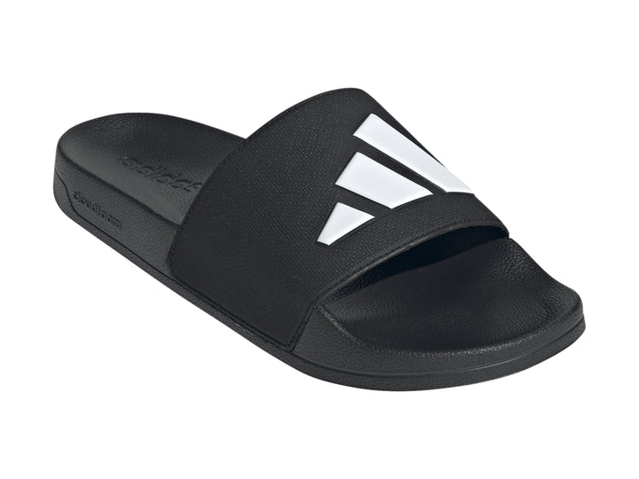 Sandalias Adidas Adilette Shower Slides en color negro con detalles blancos, vista lateral.