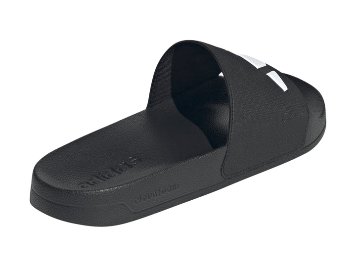 Sandalias Adidas Adilette Shower Slides en color negro con detalles blancos, vista lateral.