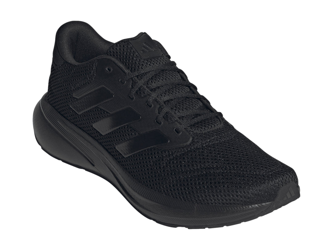 Tenis deportivos Adidas Response Runner en color negro total, vista lateral.