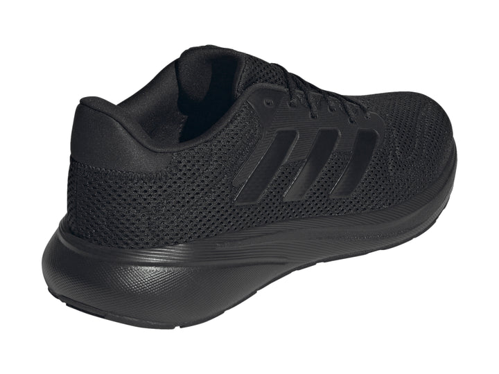 Tenis deportivos Adidas Response Runner en color negro total, vista lateral.