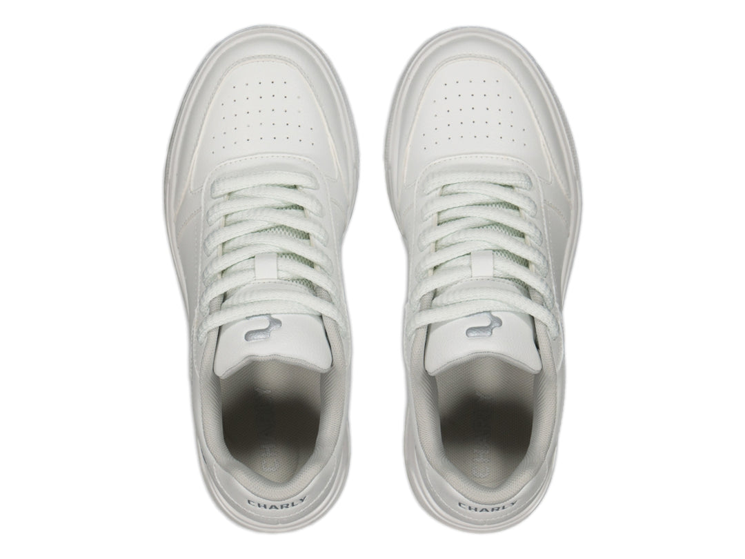 Tenis deportivos Charly color blanco con suela blanca y cordones, diseño urbano.
