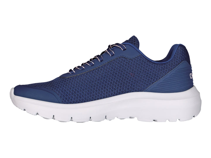 Tenis deportivos Charly en color azul marino con suela blanca y detalle rosa en el costado.