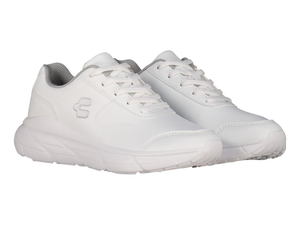 Tenis deportivos Charly de color blanco con suela gruesa y cordones.