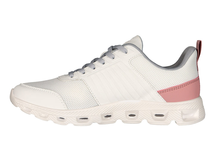 Tenis deportivos Charly color blanco con detalles en gris y rosa y suela blanca.