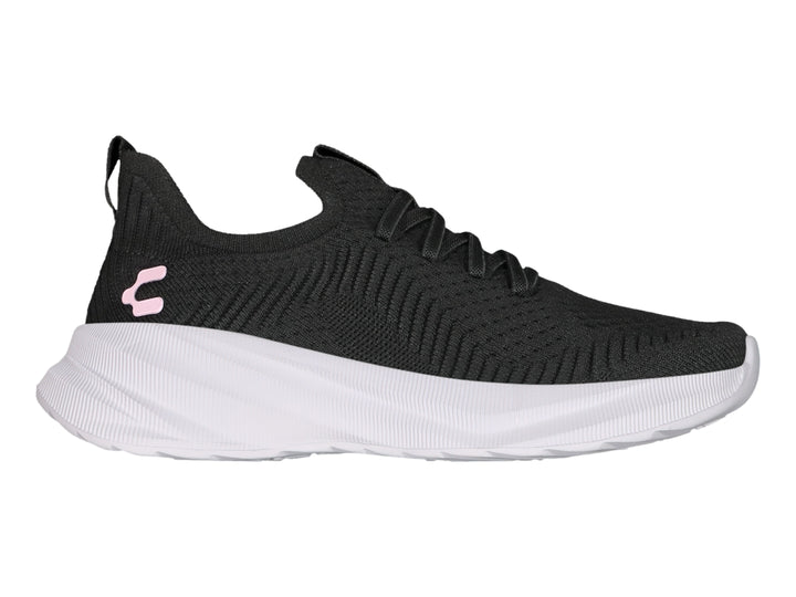 Tenis deportivos Charly color negro con suela blanca y detalle rosa en el lateral.